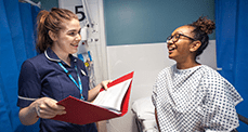 NHS Nurse and patient in conversation